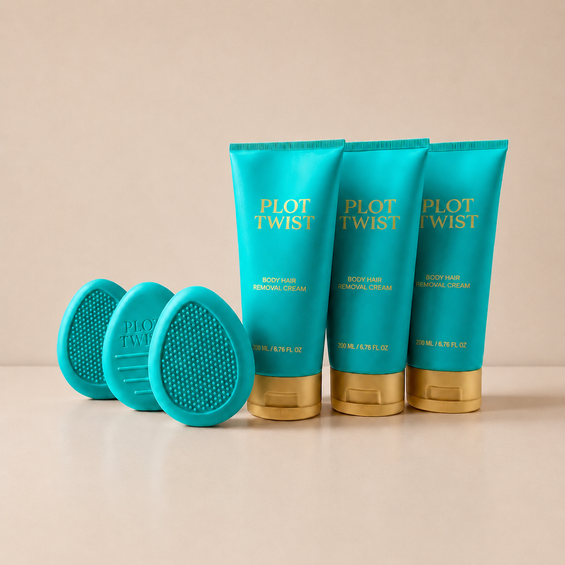 Three Plot Twist Body Hair Removal Cream tubes with reusable silicone Pebble removers